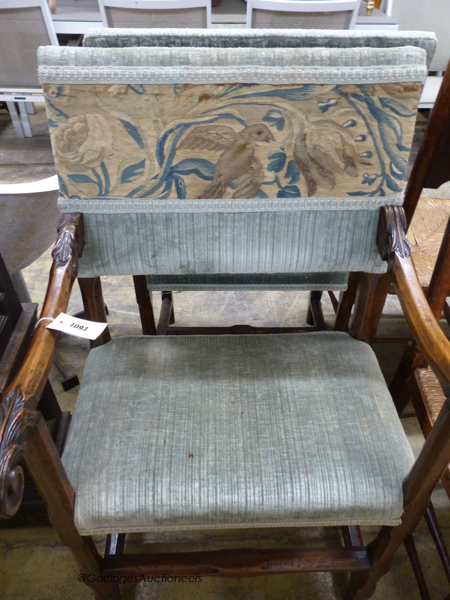 A pair of 18th century French walnut armchairs.